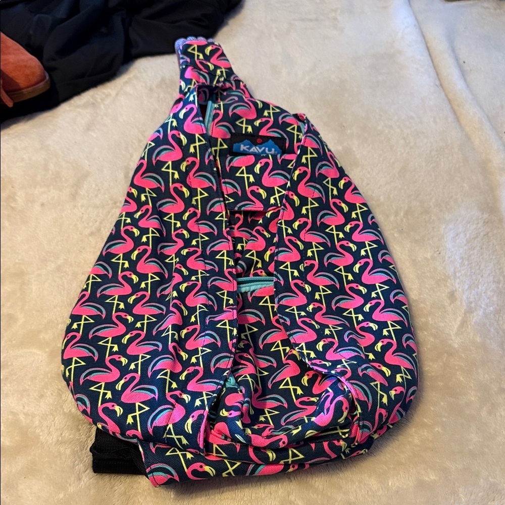 Kavu navy sling bag with pink flamingo print